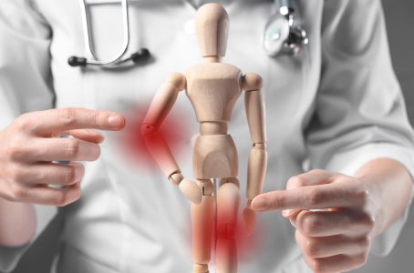 Joints ache concept. Person with red pain in elbow and knee.